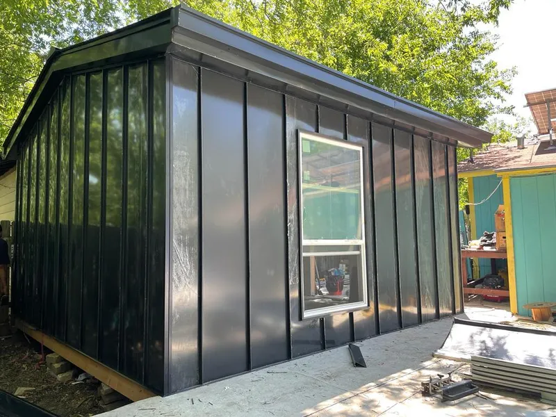 Black standing seam metal wall panels for Metal Roof Installation in New Prague