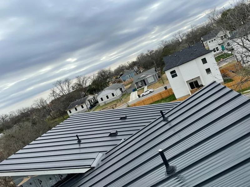 Standing seam metal roof panels with vents for Skylight Repair in New Prague